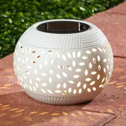 Solar Cutout Shadow Cast Round Table Lanterns